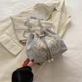 Retro light grey blue bucket bag with floral embroidery and pearl drawstring detail - Silver