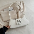 Elegante borsa a mezzaluna in pelle bianca con dettaglio fiocco in argento - Bianco