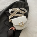 White semi-circular saddle bag with golden U-buckle and patterned wide strap - White