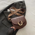 Deep brown leather saddle bag with printed wide strap and golden horseshoe buckle - Brown