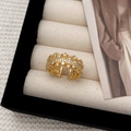 Elegant gold-plated wide ring with shimmering pavé zircon stones in a floral pattern - Dense Floral Cluster Style (C-367)
