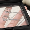 Orecchini a nodo infinito in argento con lunghe nappe e cristalli di zircone - Orecchini con Nappa con Fibbia a Ferro di Cavallo / Argento
