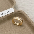 Eleganter goldener Blattring, verstellbar, mit funkelnden weißen Zirkonia-Steinen besetzt - Ring / Gold