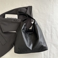 Minimalist black faux leather hobo tote bag with soft texture and solid color style - Black
