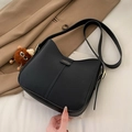 Fashionable black faux leather shoulder bag with lychee texture and monster pendant - With Pendant / Black