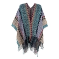 Close-up of bohemian knit shawl detailing colorful zigzag patterns and long fringe tassels - Blue-Gray