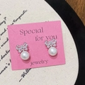 Elegant silver bow stud earrings with sparkling cubic zirconia and white hanging pearl - Silver Bow Knot Hoop Earrings