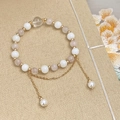 Macro di bracciale in pietre naturali con nappine a catena d'oro e ciondoli di perle - Stile Nappa in Perla di Pietra Naturale