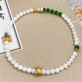 Handcrafted green chalcedony and pearl beaded bracelet with golden fortune bag charm - Green Chalcedony Shell Pearl Lucky Bag Style