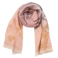 Macro detail of soft knit pink scarf featuring yellow heart patterns and fringe tassels - Pink