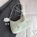 Borsa a spalla verde chiaro con farfalle metalliche e ciondolo a nuvola di peluche - Con Ciondolo / Verde