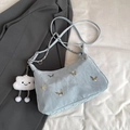 Borsa a spalla azzurra con farfalle argentate e un ciondolo morbido a nuvola - Con Ciondolo / Blu
