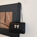Borsa a tracolla trapuntata nera con fiocco argento e tracolla a catena intrecciata - Nero