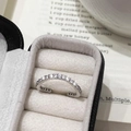Minimalist silver open ring with pavé cubic zirconia on an elegant vintage background - Pave Zirconia Row Style (A-1036)