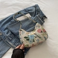 Floral embroidery hobo bag with jacquard fabric and gold metal plaque on denim background - Vintage Jacquard Style / Light Floral