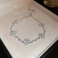 Glinsterende klaverarmband met zirkonia en parelmoer, verzilverd en verstelbaar - Zilveren Klaver Zirconia Stijl