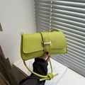Lime green leather baguette bag with gold magnetic buckle and decorative knotted strap - Green