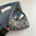 Bolso de pana gris con acolchado de rombos y estampados de lazos negros de moda - Gris