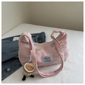 Detail of pink quilted shoulder bag with wave embroidery and plush coffee cup charm - Pink With Pendant