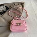 Bolso bandolera rosa para mujer con detalle de lazo dorado y acabado en cuero mate - Rosa