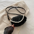 Elegant black shell-shaped crossbody bag with pearl handle and velvet texture - Black