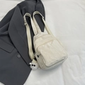 Chic beige mini backpack with marble texture and plush pendant accessory for women - With Pendant / White