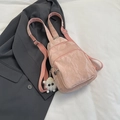 Pink pleated chest bag with silver zippers and a cute plush monster charm accessory - With Pendant / Pink