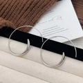 Orecchini a cerchio a spirale argento minimalisti con finitura in metallo lucido elegante - Argento Lucido