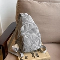 Silver-gray metallic crossbody chest bag with crinkled texture and plush pendant accessory - With Pendant / Silver