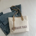 Chic off-white canvas tote bag with brown leather straps and stylish letter printing - Khaki