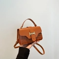 Brown faux leather crossbody bag with crocodile pattern and golden metal buckle - Brown