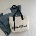 Minimalist off-white canvas tote bag with black shoulder straps and MIJOAOOU logo print - White and Black