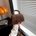 Deep brown woven texture shoulder bag with stylish lock and elegant vintage handle - Brown