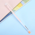 Vibrant orange highlighter pen with a transparent barrel and barcode label - Orange