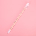 Penna gel satinata minimalista con ricarica d'inchiostro dorato su sfondo rosa - Arancione