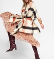 Detail of beige thick checkered scarf with orange tassels paired with a floral maxi dress - One Size / Beige Large Plaid
