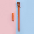 Cartoon orange neutral pen featuring a cute 3D brown dinosaur figurine top for students - Coffee