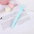 Minimalist light blue retractable gel pen on a vintage aesthetic book background - 0.5mm / Blue