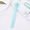 Penna gel a forma di ciambella azzurra con glassa colorata su scrivania pulita - 0.5mm / Blu