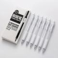 Detail of 0.5mm ST tip retractable gel pens set with 6 pieces in minimalist white design - Boxed - White Barrel