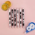 Detail of 6 retractable erasable gel pens with astronaut space theme on pink background - Black and White Space Style