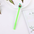 Creative green avocado gel pen with a cute cartoon character on a white desktop - Avocado with Leaf