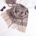 Detail of gray knitted scarf featuring long beige tassels and colorful striped accents - 210cmx70cm / Gray