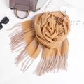 Detailed flat lay of soft yellow knitted scarf with tassels and fashion accessories - 210cmx70cm / Yellow