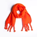 Vibrant orange knit scarf with chunky spiral tassels made of thick textured boucle yarn - Orange