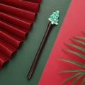 Brown Christmas click pen featuring a green decorative rubber Christmas tree topper - Brown Christmas Tree