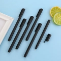 Minimalist matte black gel pen set for office and student writing on blue background - Solid Black Pen Body