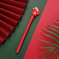 Christmas neutral pen featuring a cute Santa Claus silicone charm on a red barrel - Red Santa Claus