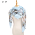 Classic plaid scarf in light blue and grey with soft tassels shown on a torso mannequin - Light Blue (FJ-40#)