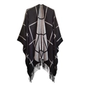 Women's plaid tassel poncho shawl featuring a black and grey checkered knit design - Black